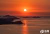 9月8日，日出时分的崂山湾。拍摄/修相科